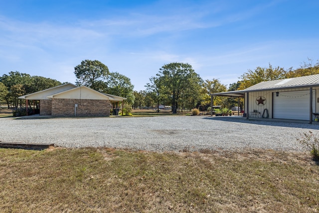 view of yard with a carport