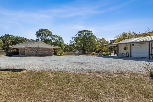 view of yard with a carport