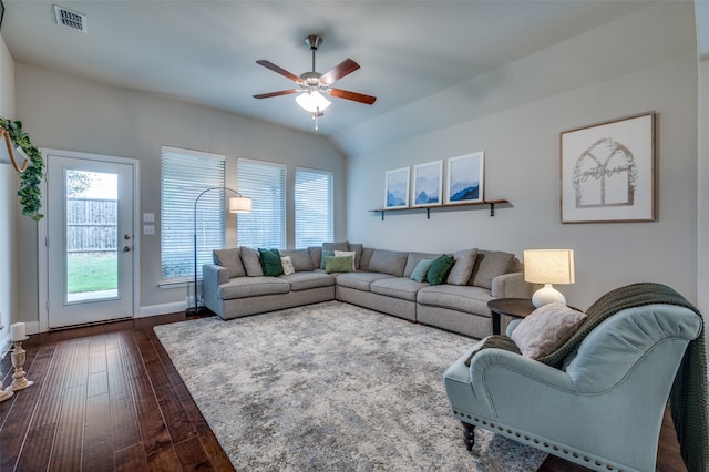 living room with vaulted ceiling, ceiling fan, and dark hardwood / wood-style floors