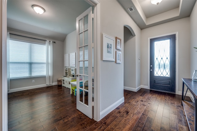 entrance foyer with french doors and dark wood-type flooring