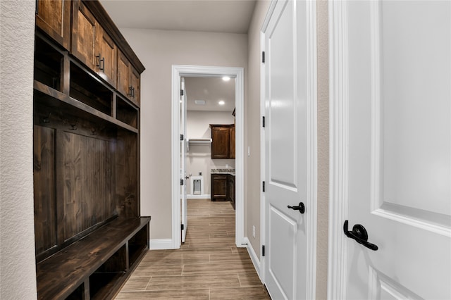 mudroom featuring light wood-type flooring