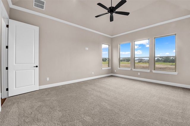 empty room with carpet flooring, ceiling fan, and ornamental molding