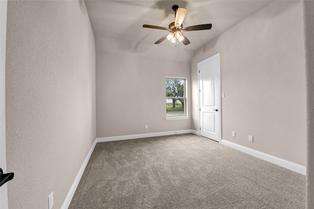 carpeted empty room with ceiling fan