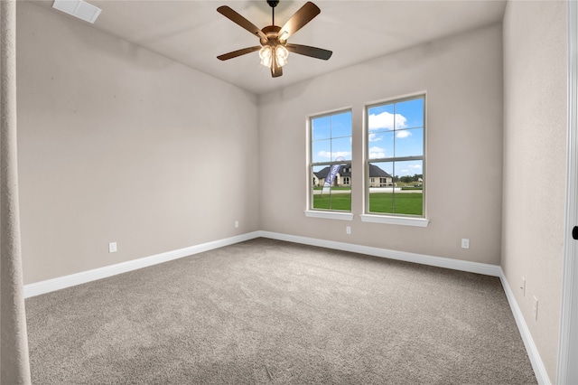 carpeted empty room with ceiling fan