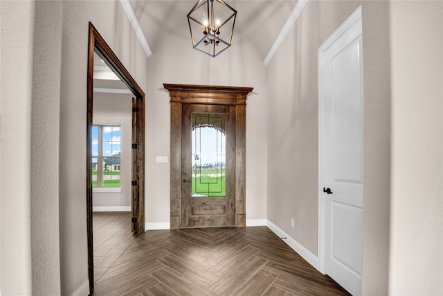 entryway featuring dark parquet flooring and a notable chandelier