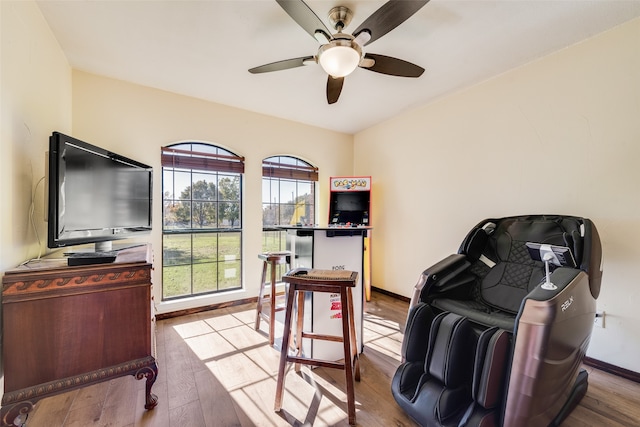 office area featuring ceiling fan and light wood-type flooring