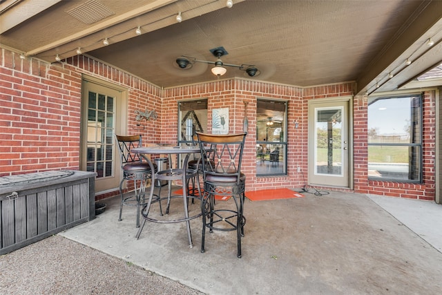 view of patio with ceiling fan