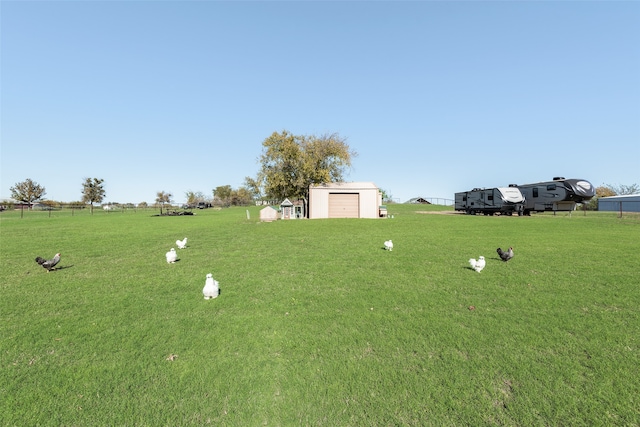 view of yard with a storage shed