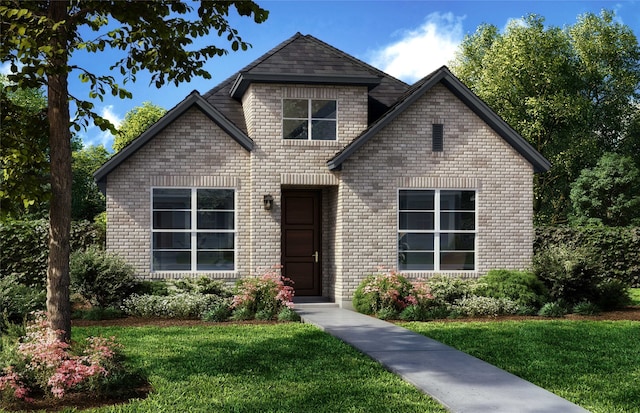 front facade featuring a front yard