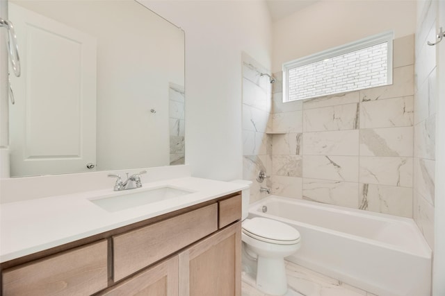 full bathroom featuring vanity, marble finish floor, toilet, and shower / washtub combination