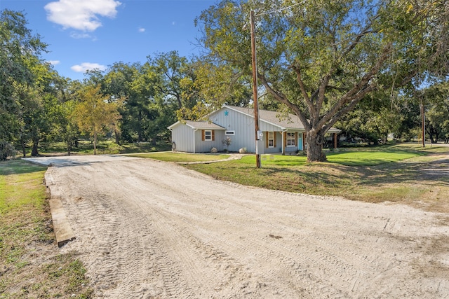 exterior space with a front yard