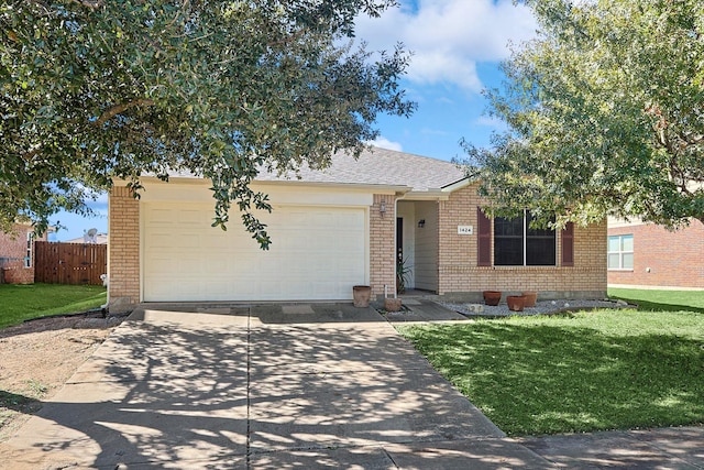 ranch-style house with a garage and a front yard