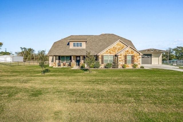 view of front of house with a front yard and a carport