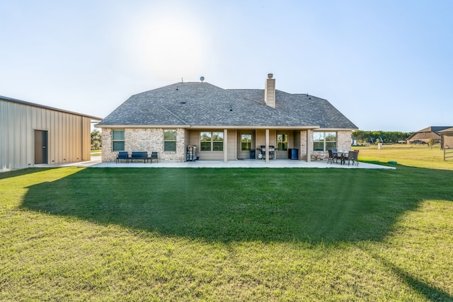 7809 Emersyn Dr, Rio Vista, TX 76093 - rear view of property with a lawn and a patio