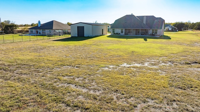 7809 Emersyn Dr, Rio Vista, TX 76093 - view of yard with a garage and an outdoor structure