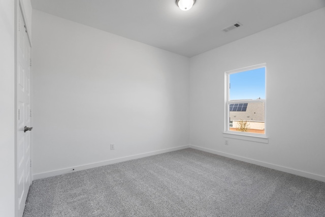 spare room with carpet flooring