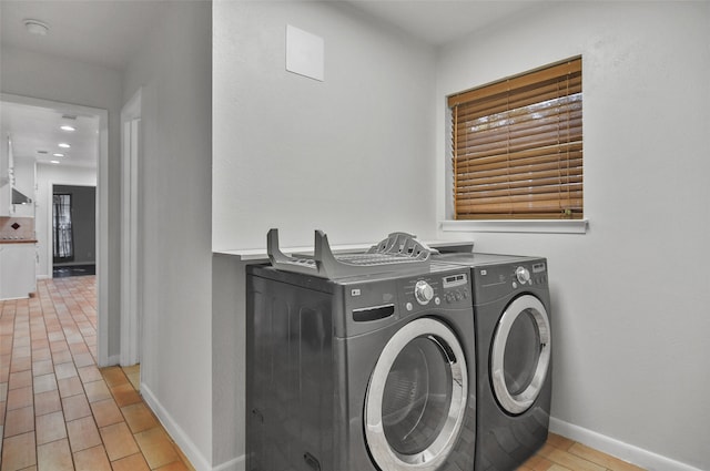 laundry area with washer and clothes dryer