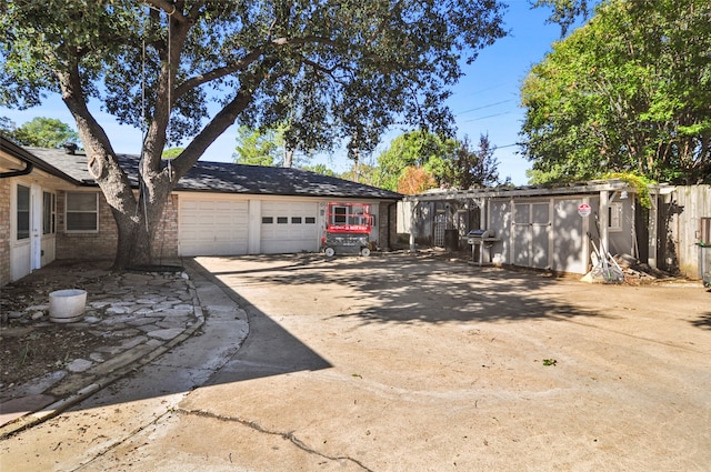 single story home with a garage