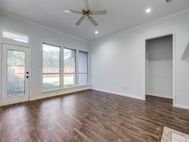 interior space with crown molding, dark wood-type flooring, and ceiling fan