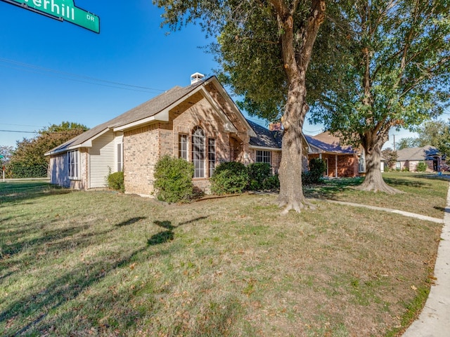 view of front of house with a front yard