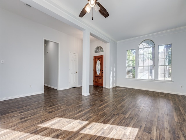 unfurnished living room with ceiling fan, ornamental molding, and dark hardwood / wood-style flooring