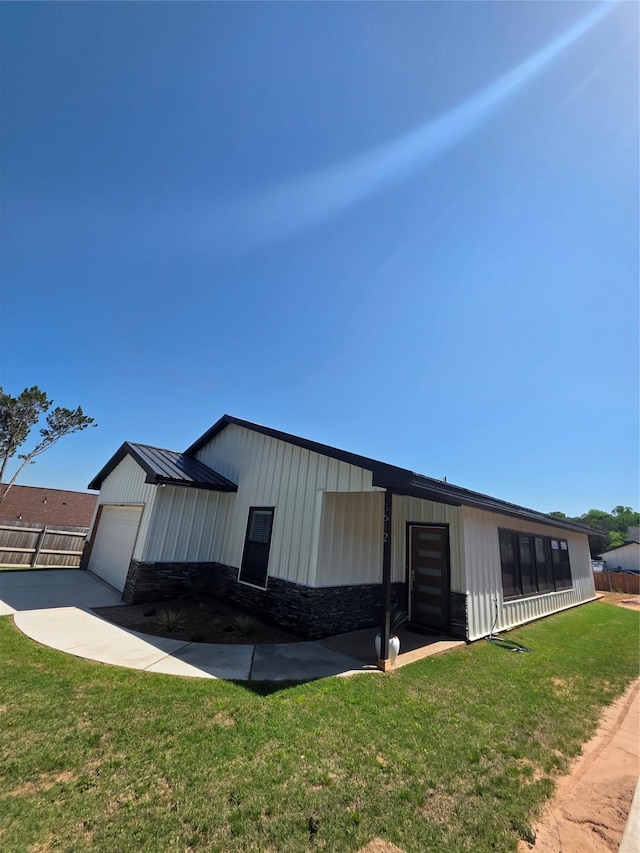 3612 Broken Bow Dr, Granbury, TX 76048 - view of front of property with stone siding, board and batten siding, and a garage