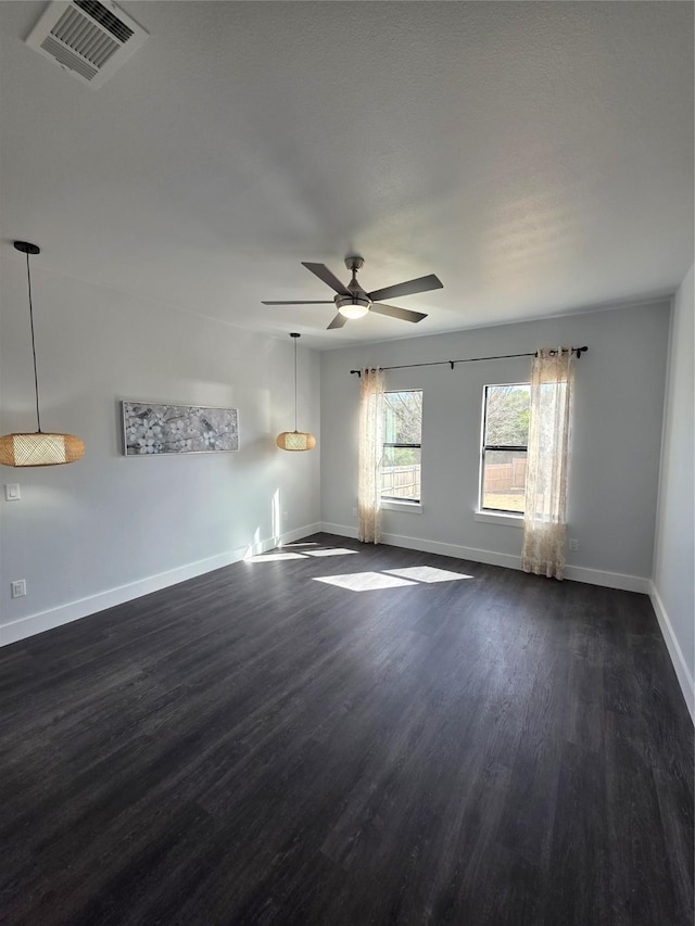 3612 Broken Bow Dr, Granbury, TX 76048 - unfurnished room featuring dark wood finished floors, a ceiling fan, and baseboards