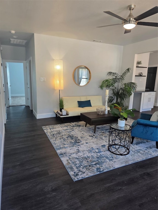 3612 Broken Bow Dr, Granbury, TX 76048 - living room with wood finished floors, baseboards, and a ceiling fan