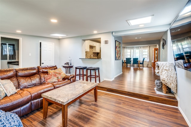 living room with hardwood / wood-style floors