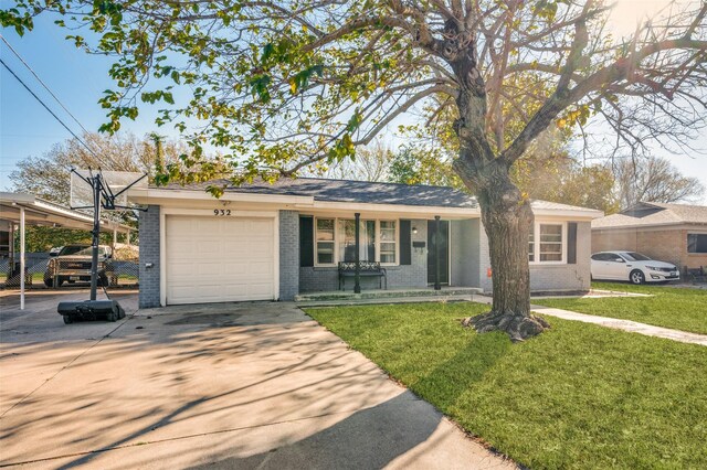 ranch-style home featuring a front lawn, a porch, and a garage