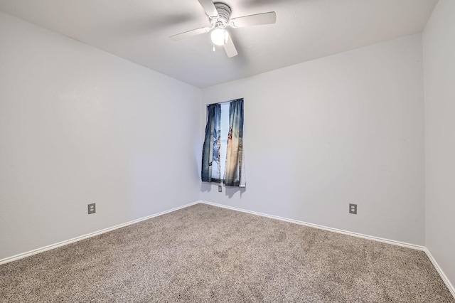 empty room with carpet flooring and ceiling fan