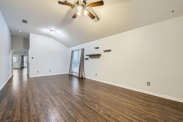 unfurnished living room featuring ceiling fan, lofted ceiling, and dark hardwood / wood-style floors