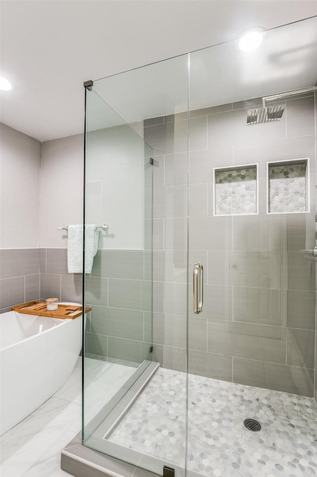 bathroom with independent shower and bath