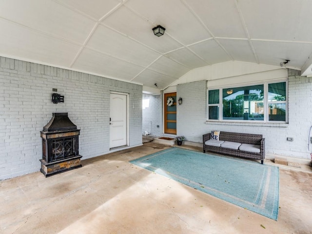 view of pool with a fireplace and a patio area