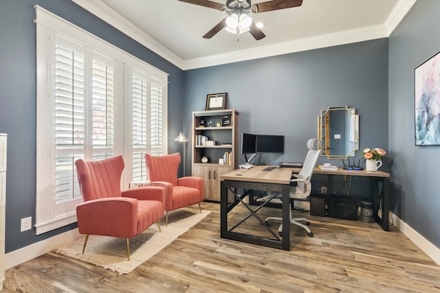 home office with ceiling fan, ornamental molding, and light hardwood / wood-style flooring