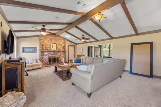 carpeted living room featuring ceiling fan, lofted ceiling with beams, and a brick fireplace