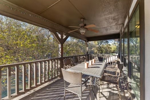 wooden terrace with ceiling fan