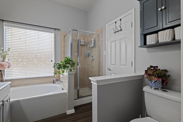 full bathroom with toilet, a healthy amount of sunlight, shower with separate bathtub, and wood-type flooring