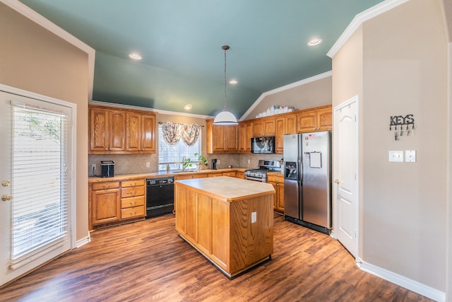 kitchen with a center island, dark hardwood / wood-style flooring, decorative light fixtures, lofted ceiling, and black appliances