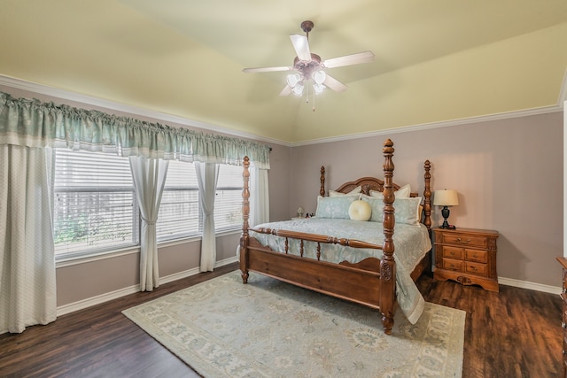 bedroom with ceiling fan, dark hardwood / wood-style flooring, lofted ceiling, and crown molding