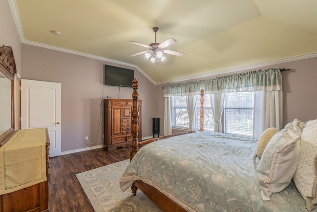 bedroom featuring ceiling fan, dark hardwood / wood-style flooring, ornamental molding, and vaulted ceiling