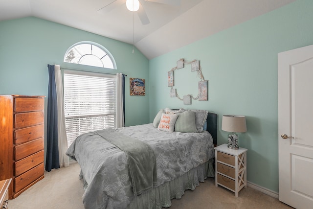 bedroom featuring light carpet, ceiling fan, and lofted ceiling