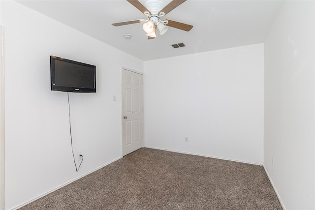 unfurnished bedroom with carpet floors and ceiling fan