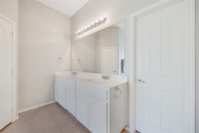 bathroom featuring tile patterned floors and vanity