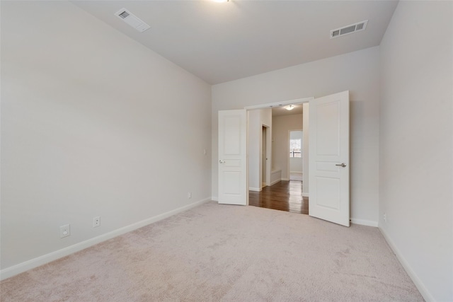 unfurnished bedroom featuring carpet