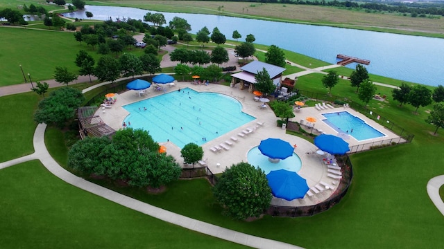 birds eye view of property featuring a water view