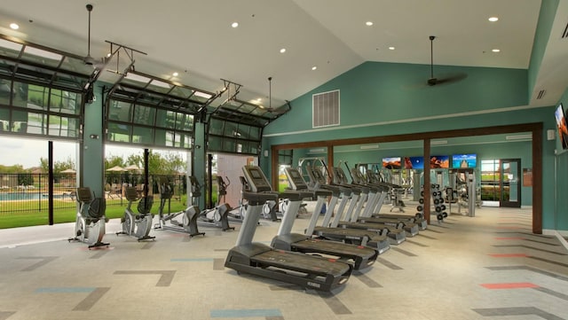 workout area with carpet floors and high vaulted ceiling