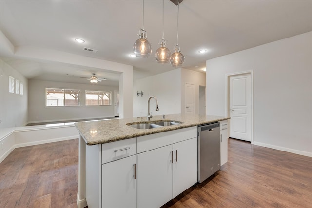 kitchen featuring white cabinetry, dishwasher, sink, dark hardwood / wood-style flooring, and a center island with sink