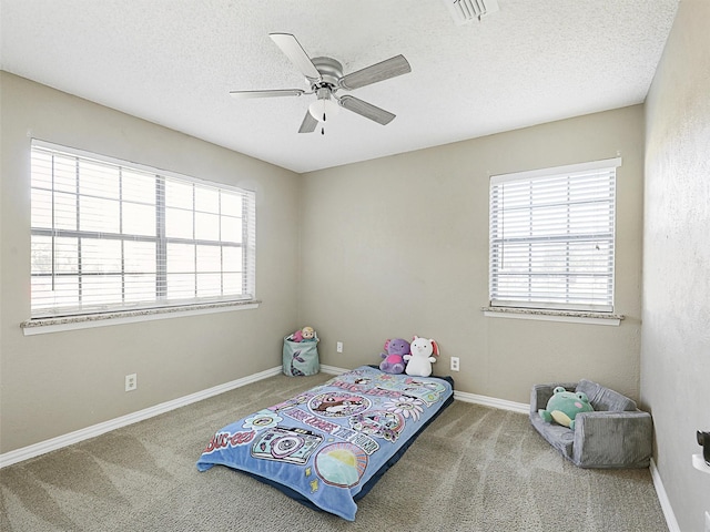 305 Dena, Krugerville, TX 76227 - bedroom featuring carpet floors, baseboards, a textured ceiling, and ceiling fan