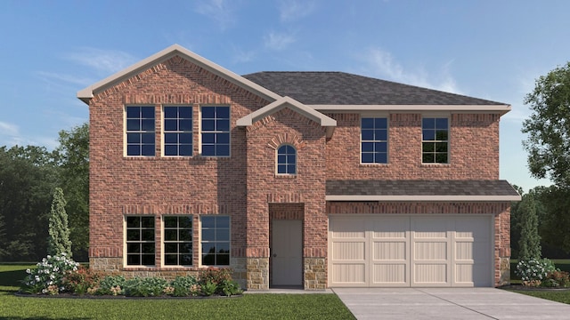 view of front of home with a front lawn and a garage